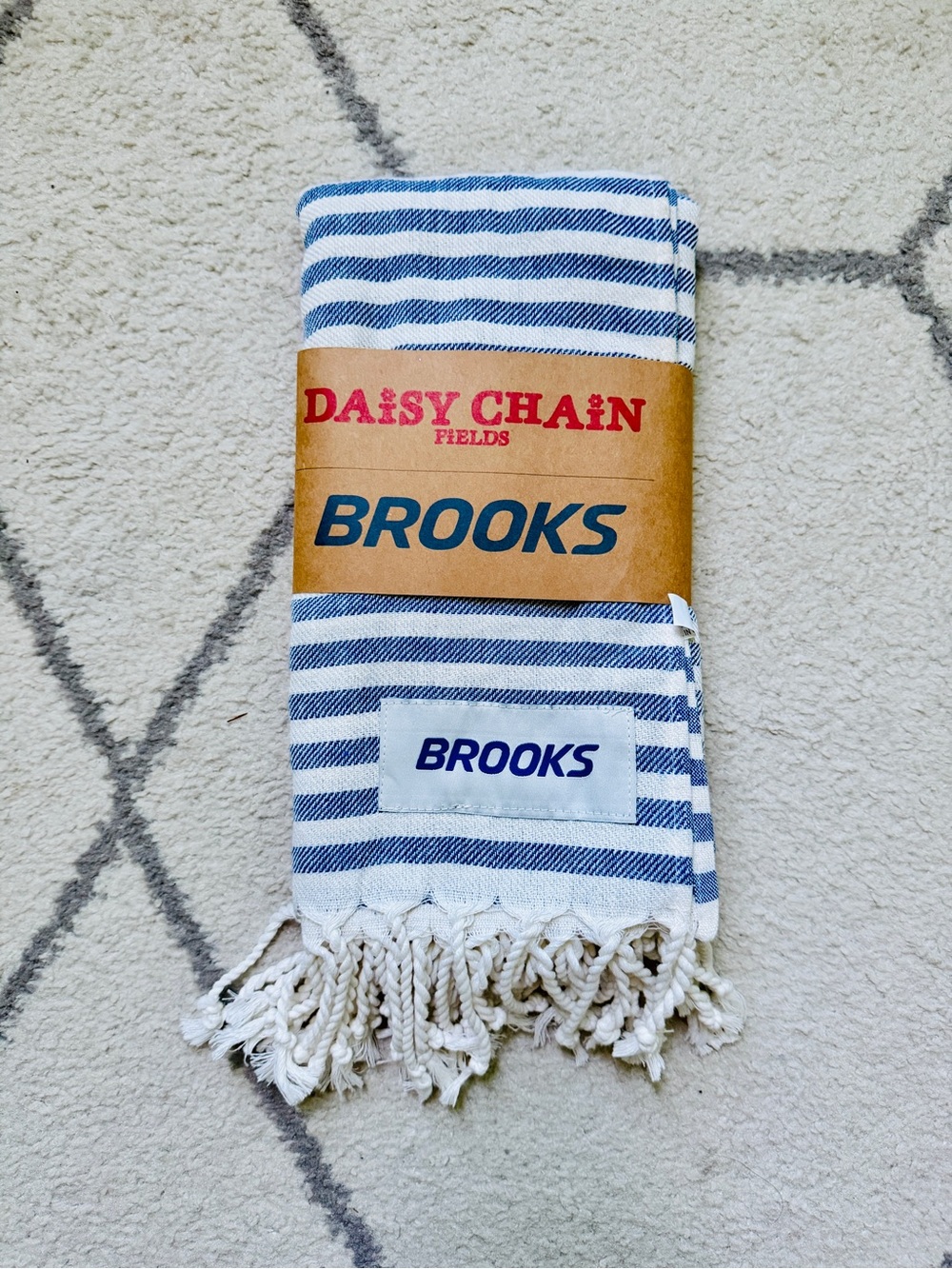 daisy chain x brooks limited edition blue and white striped throw blanket